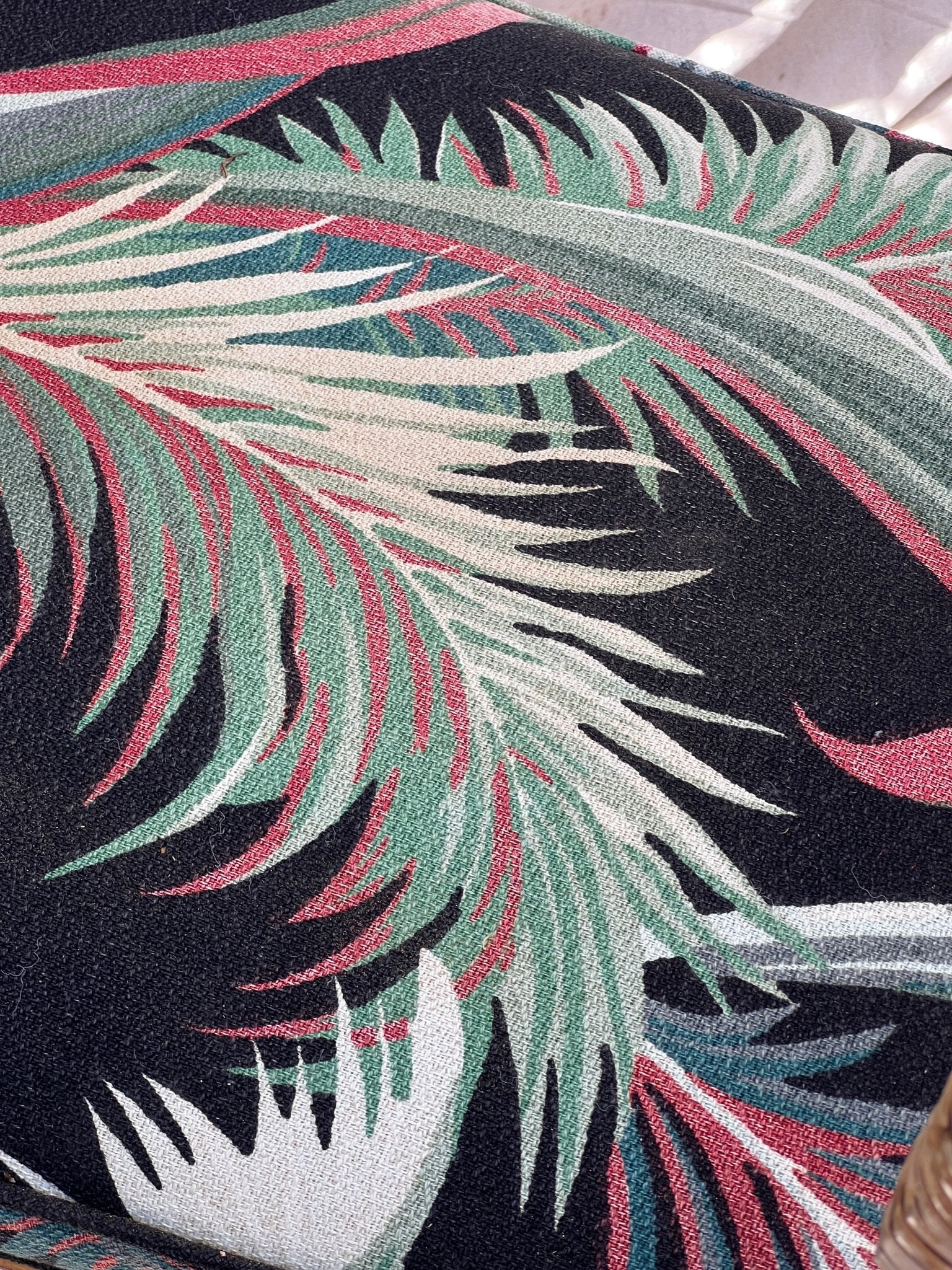 Hollywood Palm upholstery detail for Rattan Bistro Table with Black Glass Top – vibrant and stylish design. hommes + gardens estudio.