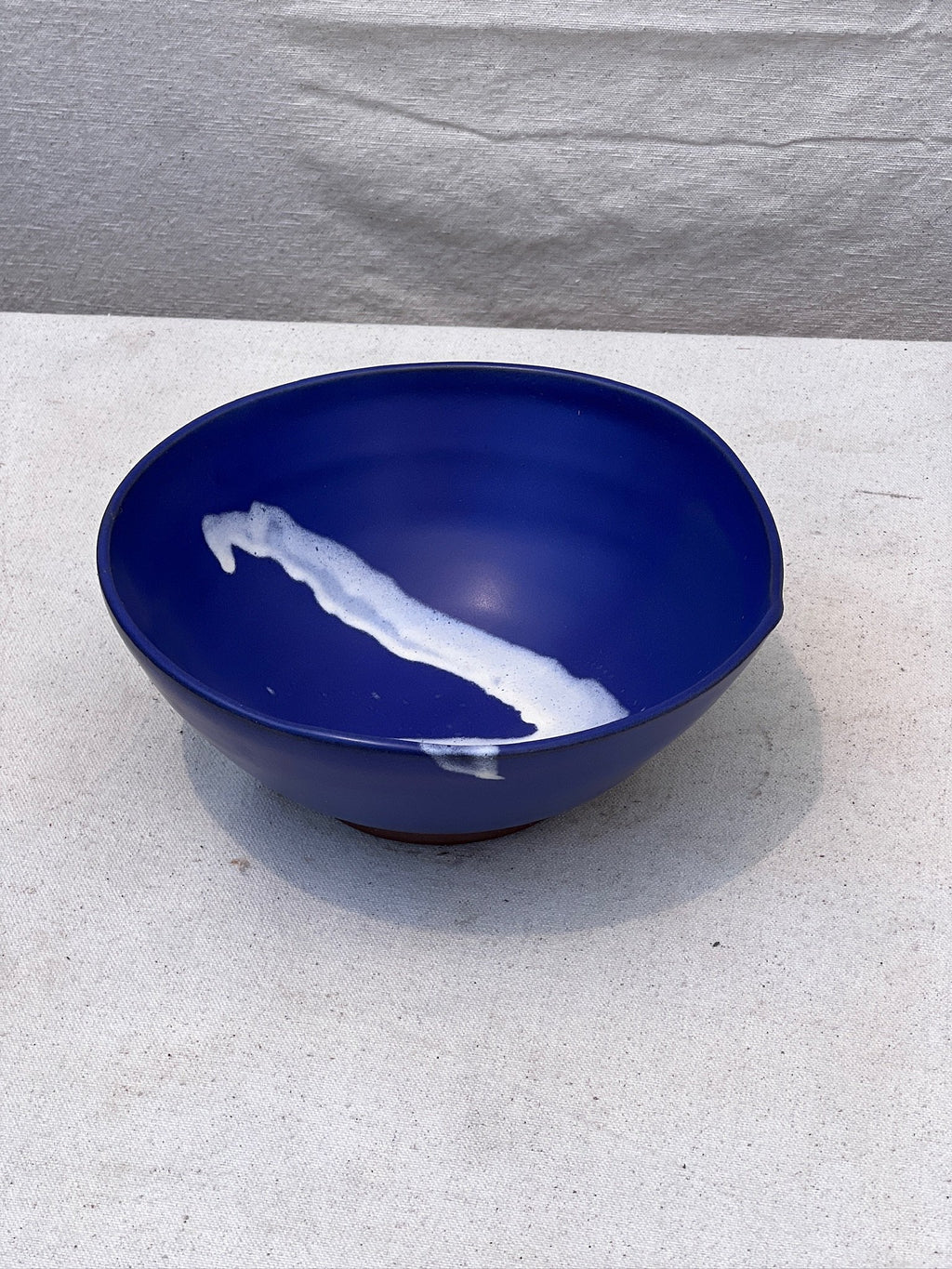handmade ceramic bowl blue glaze tabletop styling