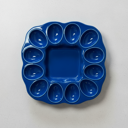 Vintage blue ceramic deviled egg plate, handcrafted serving dish with classic design and elegant tableware charm — Hommes and Gardens, Decorative Collection, Landscape Architect, Interior Designer, Outdoor Living, Outdoor Decorations, Home Decor, Home Design, Luxury Design, Art, Furniture, Objects, Best Gifts, Nature, Backyard, Yard.