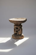 Carved primitive style wooden stool from the Shona people of Zimbabwe, featuring openwork central pillar and rustic craftsmanship, a unique cultural furniture piece — Hommes and Gardens, Furniture Collection, Home Decor, Outdoor Decorations, Landscape Architect, Interior Designer, Outdoor Living, Home Design, Luxury Design, Art, Furniture, Objects, Best Gifts, Nature, Backyard, Yard.