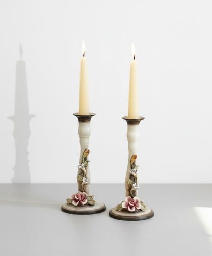 Pair of ceramic candlesticks with delicate floral decoration and smooth glazed finish, perfect for elegant dining or mantel styling — Hommes and Gardens, Smoke + Fire Collection, Candle Holders, Home Decor, Decorative Objects, Classic Interior Design.