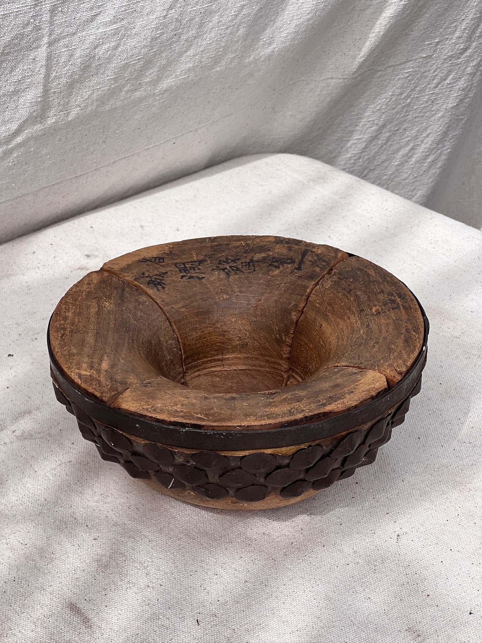 Primitive Chinese Wood & Animal Skin Bowl showcasing intricate animal skin details and Asian characters. hommes + gardens estudio.