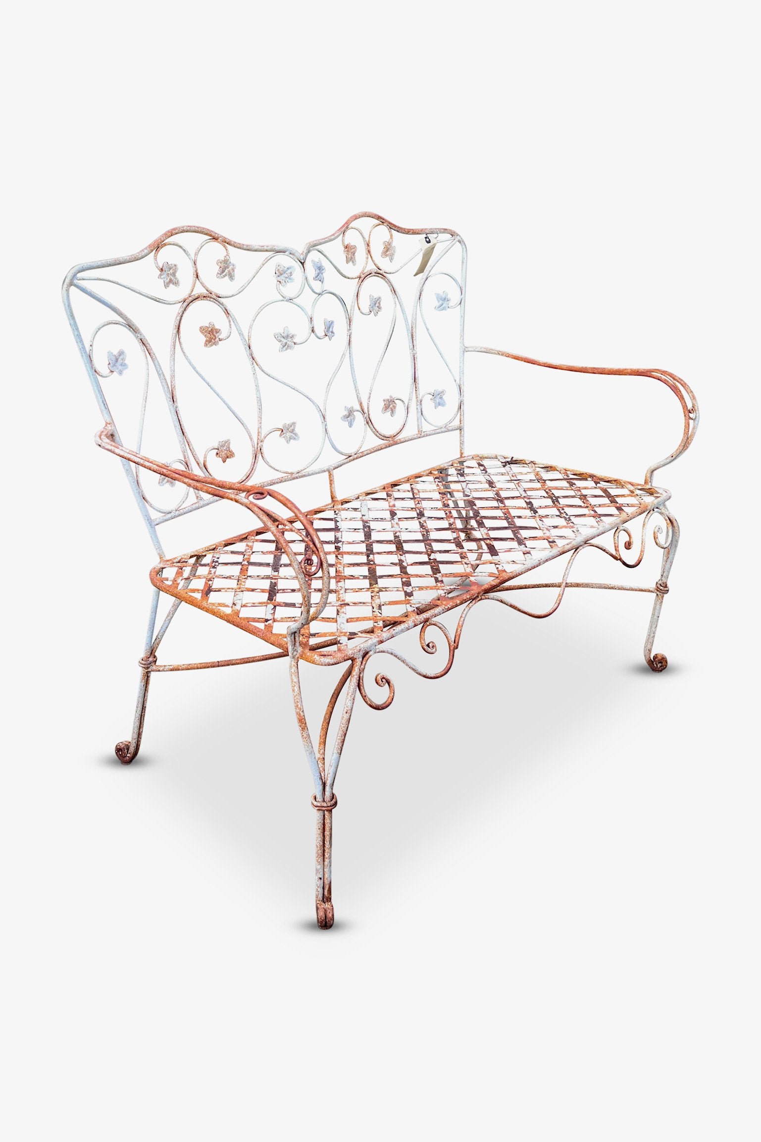 Vintage Wrought Iron Garden Bench with classic scroll design and delicate foliage accents. hommes + gardens estudio.