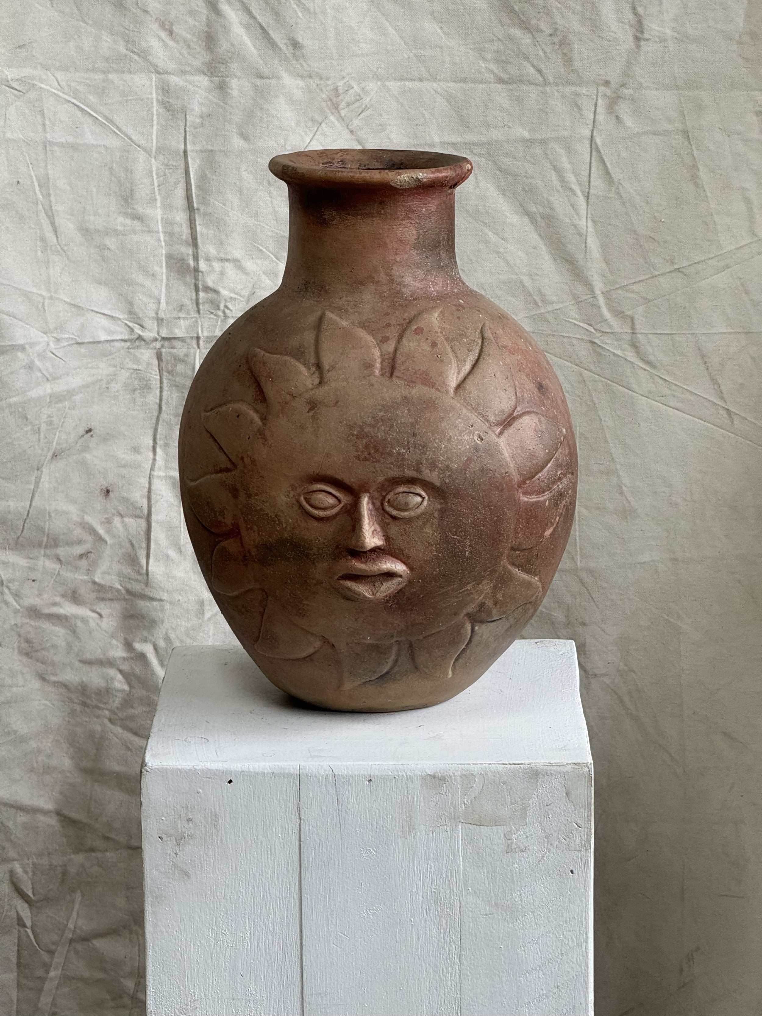 Collectible mid-century dual-sided ceramic vase with intricate sun and moon faces, embodying organic artistic charm — Hommes and Gardens, Pots & Vessels Collection, Home Decor, Outdoor Decorations, Landscape Architect, Interior Designer, Outdoor Living, Home Design, Luxury Design, Art, Furniture, Objects, Nature, Best Gifts, Backyard, Yard.