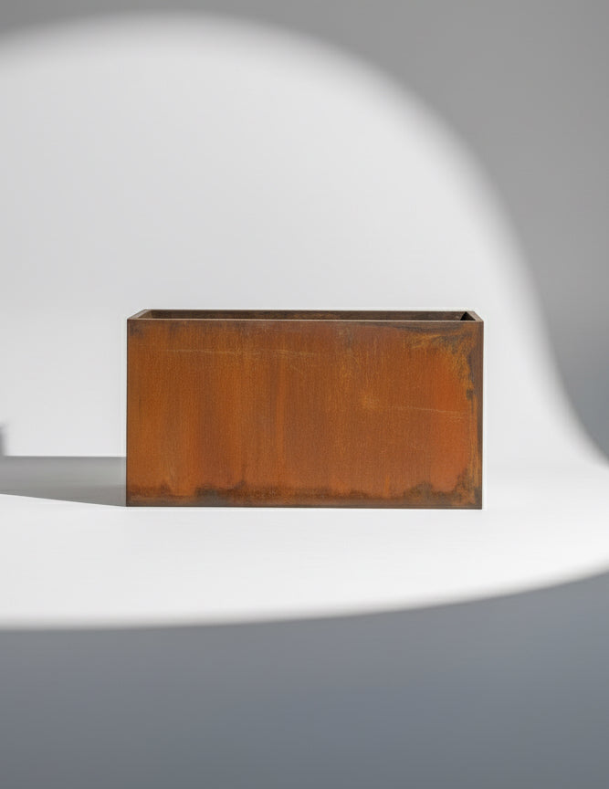 Corten steel rectangular planter designed by Michael, featuring sleek industrial lines and rusted finish, perfect for modern edible gardens and contemporary outdoor design — Hommes and Gardens, Pots & Vessels Collection, Home Decor, Outdoor Decorations, Landscape Architect, Interior Designer, Outdoor Living, Home Design, Luxury Design, Art, Furniture, Objects, Best Gifts, Nature, Backyard, Yard.