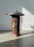 Rustic Handmade Mushroom Sculpture – Log Stem with Metal Cap Garden Ornament on a light floor. hommes + gardens estudio.