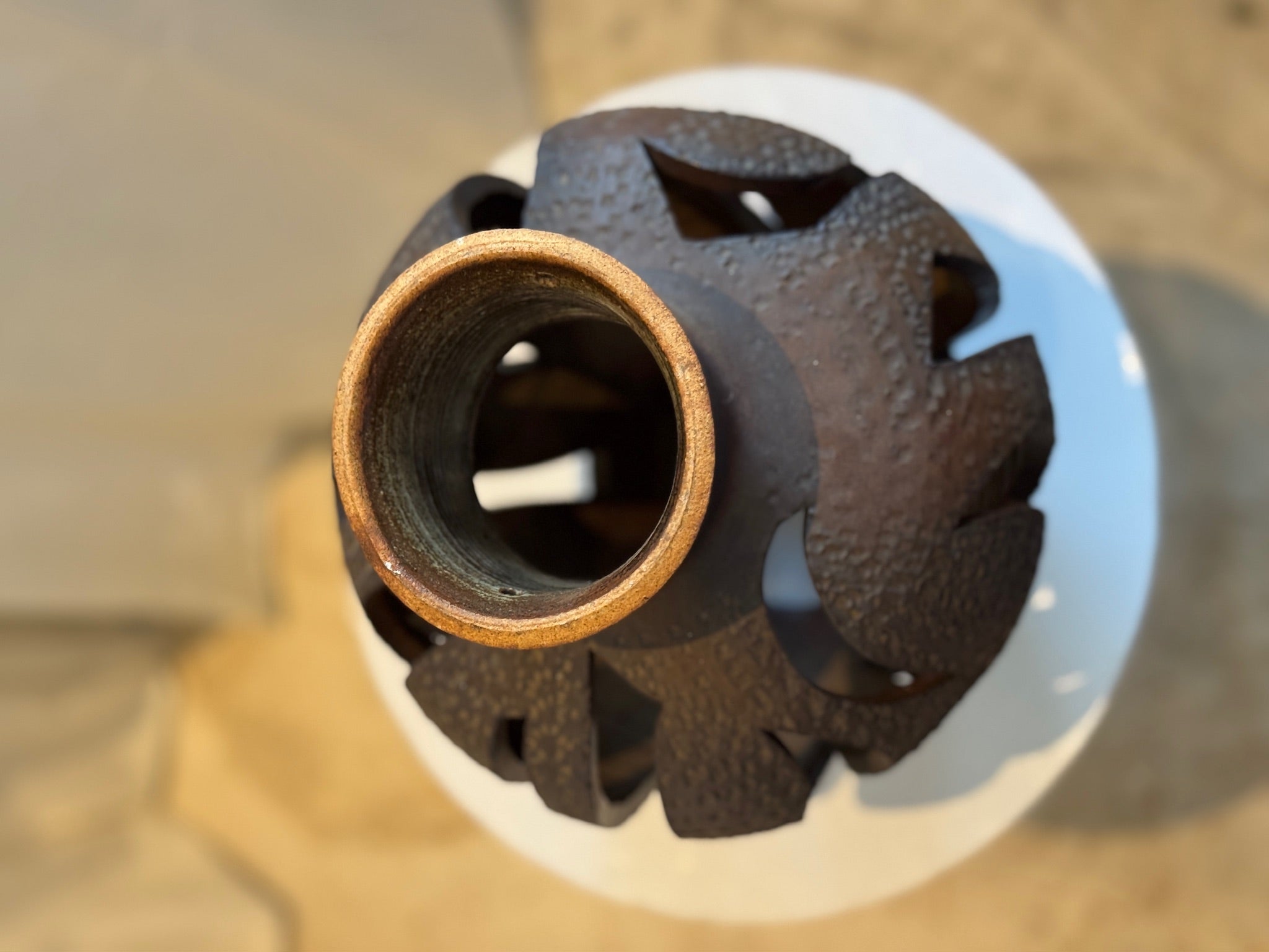 David Cressey–style mid-century ceramic sculptural vase with openwork cutouts and organic form, rich earthen tones and textured surface — Hommes and Gardens, Objects + Vases & Vessels Collection, Landscape Architect, Interior Designer, Outdoor Living, Art, Furniture, Objects, Best Gifts, Nature, Backyard, Yard, Outdoor Decorations, Home Decor, Home Design, Luxury Design.