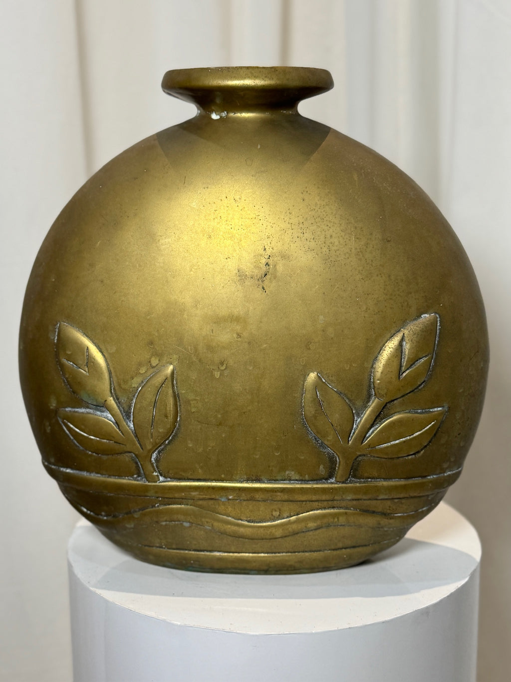 Dolbi Cashier 1980s handcrafted brass vase with embossed floral and wave pattern, Art Deco-inspired form and elegant flared mouth design — Hommes and Gardens, Vases + Vessels Collection, Landscape Architect, Interior Designer, Outdoor Living, Art, Furniture, Objects, Best Gifts, Nature, Backyard, Yard, Outdoor Decorations, Home Decor, Home Design, Luxury Design.
