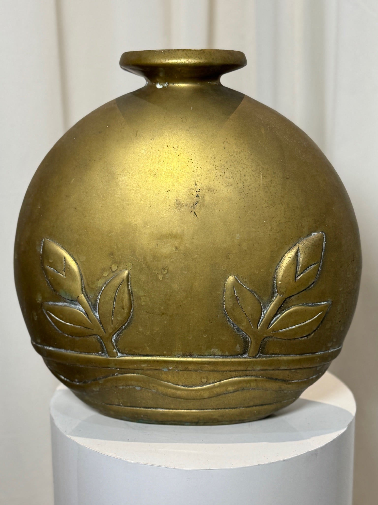 Dolbi Cashier 1980s handcrafted brass vase with embossed floral and wave pattern, Art Deco-inspired form and elegant flared mouth design — Hommes and Gardens, Vases + Vessels Collection, Landscape Architect, Interior Designer, Outdoor Living, Art, Furniture, Objects, Best Gifts, Nature, Backyard, Yard, Outdoor Decorations, Home Decor, Home Design, Luxury Design.