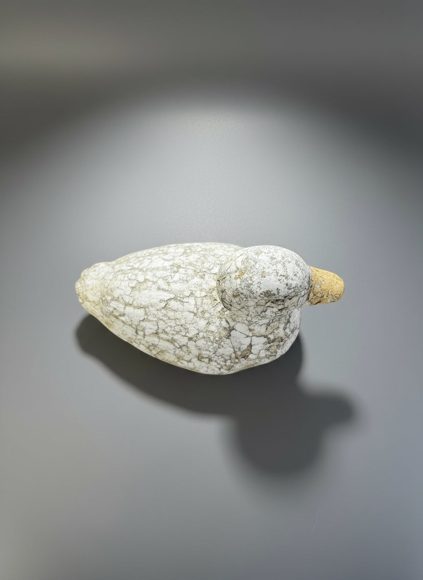 Weathered Vintage Concrete Duck Garden Sculpture – Rustic Folk Art Décor, handcrafted in aged white with yellow undertones, dessus hommes + gardens estudio.