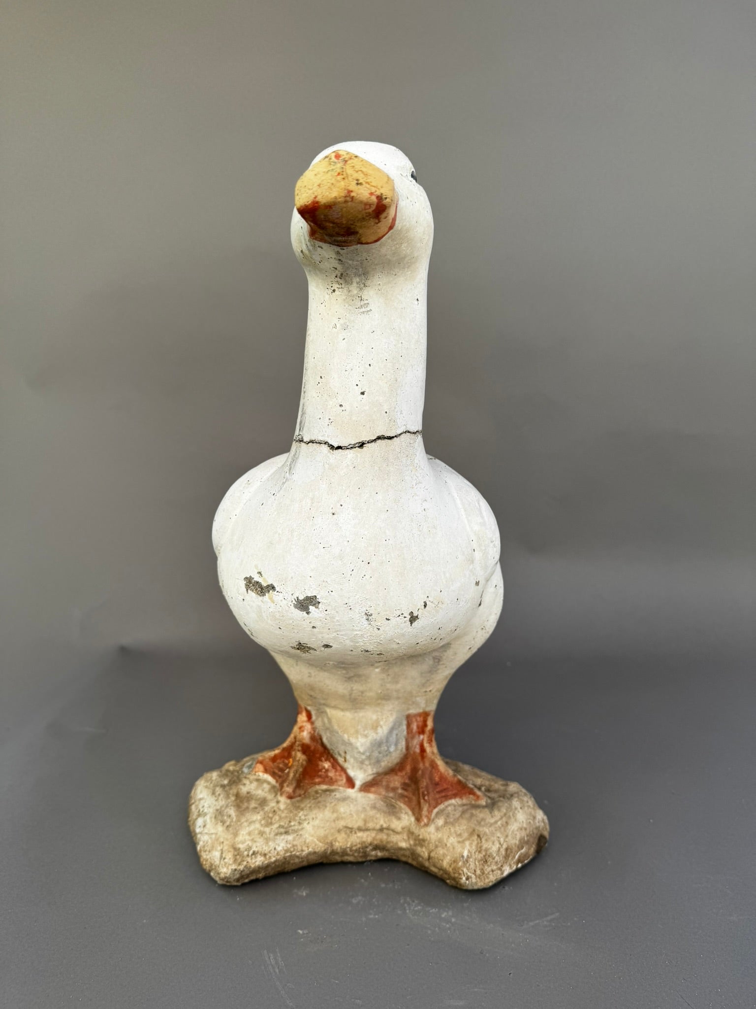 Vintage Handcrafted Concrete Duck Garden Sculpture – Rustic Outdoor Decor - Charming garden statue with warm tones, perfect for outdoor settings. hommes + gardens estudio.