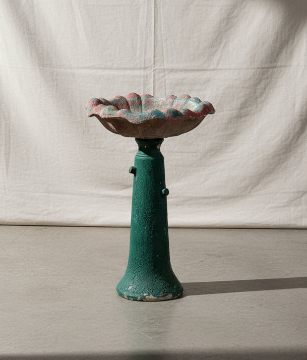 Early 20th-century painted concrete birdbath with pottery base featuring red and green patina, a vintage garden centerpiece exuding timeless charm and weathered artistry — Hommes and Gardens, Water Features Collection, Home Decor, Outdoor Decorations, Landscape Architect, Interior Designer, Outdoor Living, Home Design, Luxury Design, Art, Furniture, Objects, Best Gifts, Nature, Backyard, Yard.