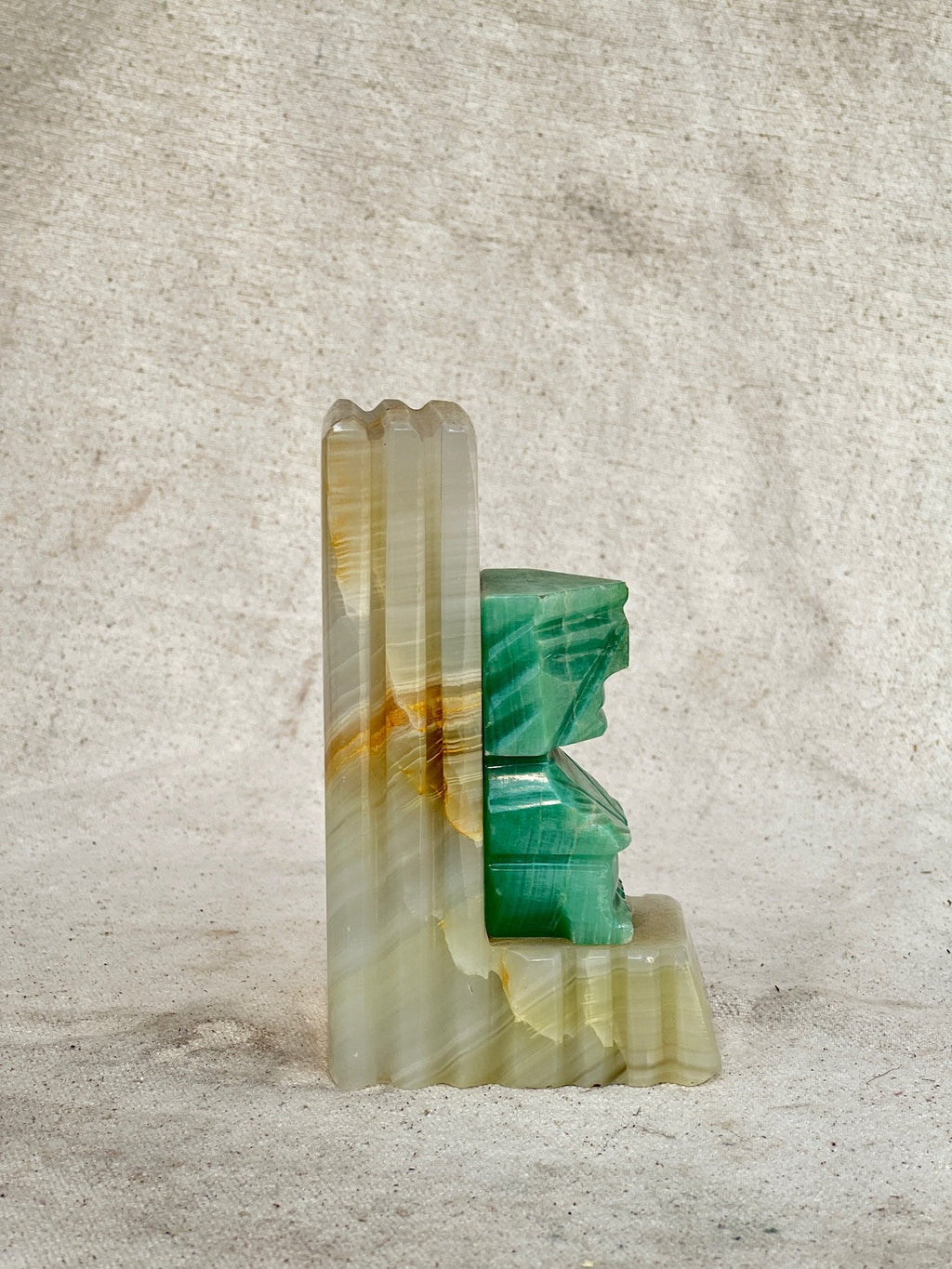 Carved Onyx Stone Bookend (Single) showcasing unique green and beige stone design, 5.5”H x 3.25”W x 2”L. hommes + gardens estudio.