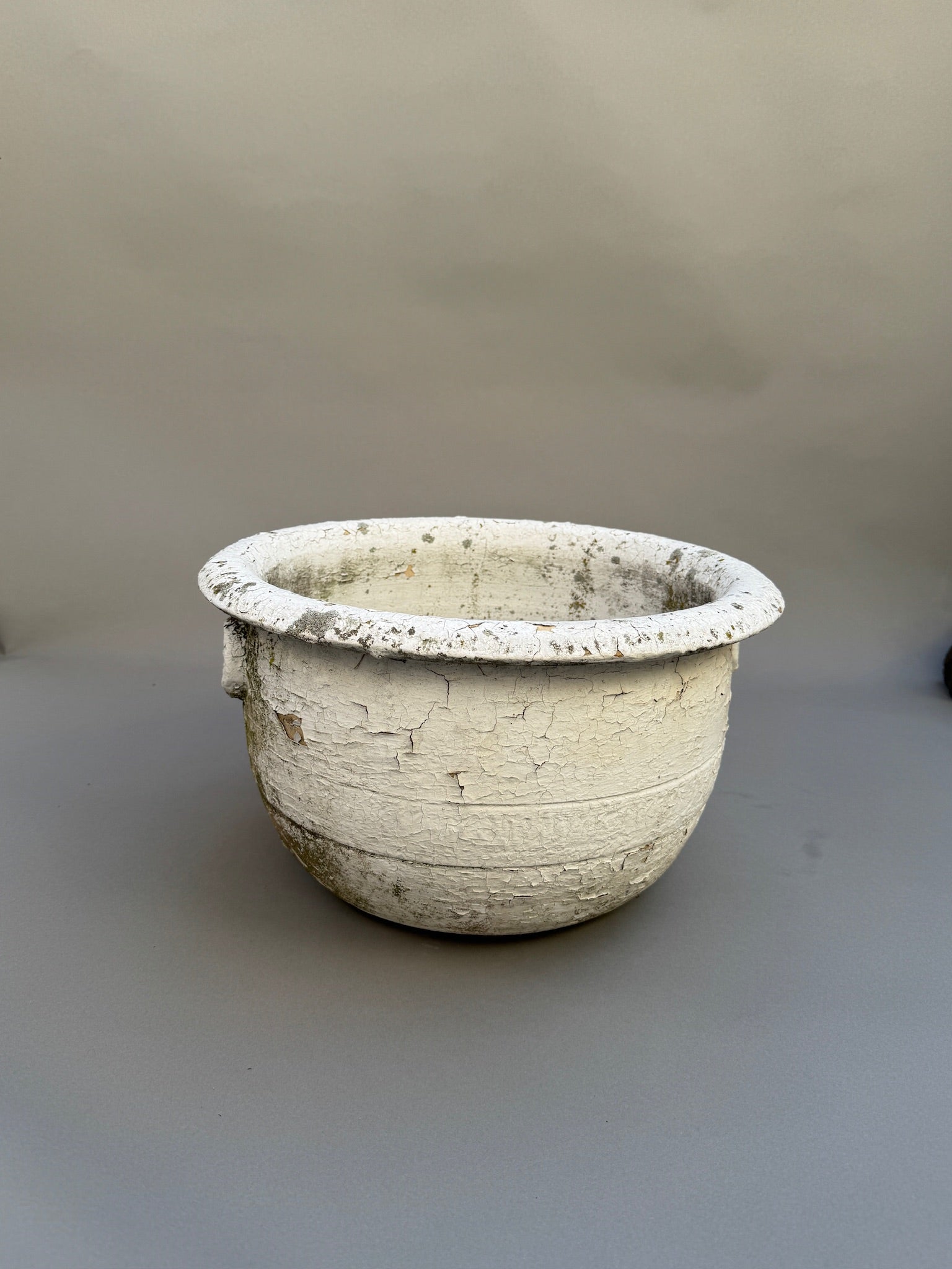 Antique European Terracotta Planter with Aged White Patina, showcasing crackled finish and rustic charm. hommes + gardens estudio.