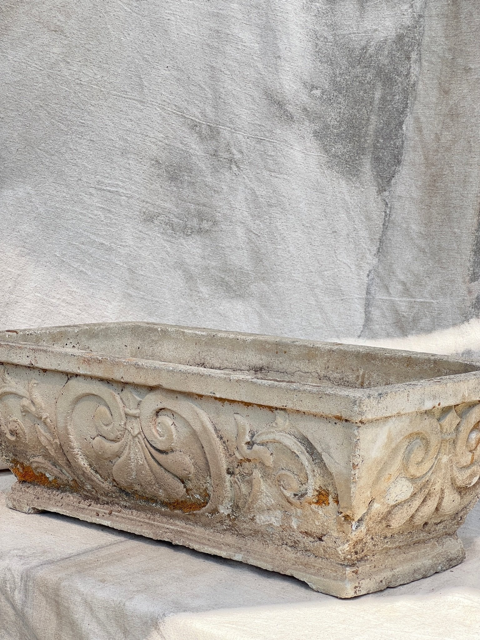 French vintage gray cement planter with Fleur-de-Lis relief detailing from the 1950s, sturdy rectangular vessel for elegant garden styling — Hommes and Gardens, Pots + Planters Collection, Landscape Architect, Interior Designer, Outdoor Living, Art, Furniture, Objects, Best Gifts, Nature, Backyard, Yard, Outdoor Decorations, Home Decor, Home Design, Luxury Design.