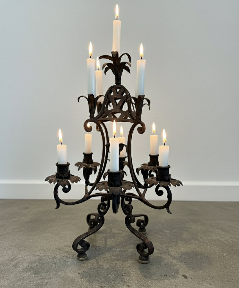 Antique French Wrought Iron Candelabra with Gothic Floral Motifs showcasing elegant scrollwork and nine candle holders. hommes + gardens estudio.