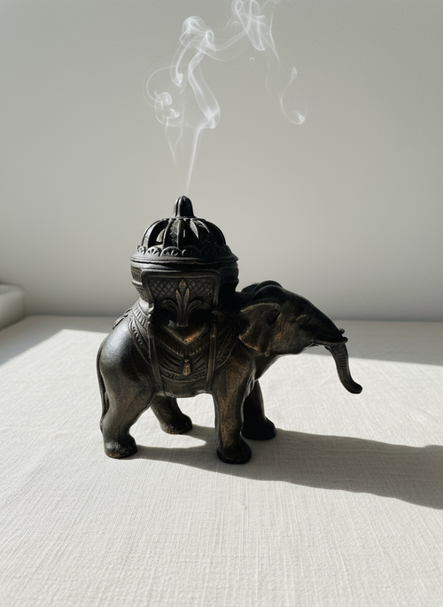 Good Luck Elephant censer inspired by Japanese artistry, featuring a finely carved elephant design with incense chamber for creating a serene aromatic atmosphere — Hommes and Gardens, Smoke + Fire Collection, Fauna Collection, Home Decor, Outdoor Decorations, Landscape Architect, Interior Designer, Outdoor Living, Home Design, Luxury Design, Art, Furniture, Objects, Best Gifts, Nature, Backyard, Yard.