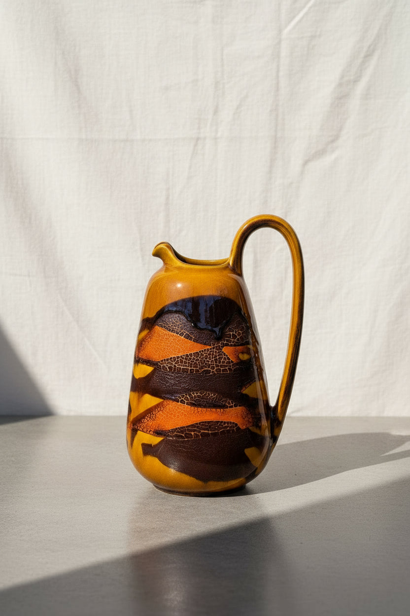 Mid-century Royal Haeger Earth Wrap pottery pitcher with orange matte glaze and yellow-brown lava drip overglaze, a striking vintage ceramic collectible — Hommes and Gardens, Pots & Vessels Collection, Home Decor, Outdoor Decorations, Landscape Architect, Interior Designer, Outdoor Living, Home Design, Luxury Design, Art, Furniture, Objects, Best Gifts, Nature, Backyard, Yard.