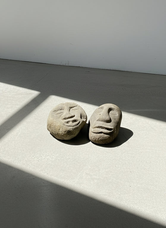 Pair of hand-carved stone tribal face sculptures with expressive primitive features, ideal for garden or interior display — Hommes and Gardens, home decor, garden decor, outdoor decorations, home design, luxury design, Landscape Architect, Interior Designer, Outdoor Living, Art, Furniture, Objects, Best Gifts, Nature, Backyard, Yard.