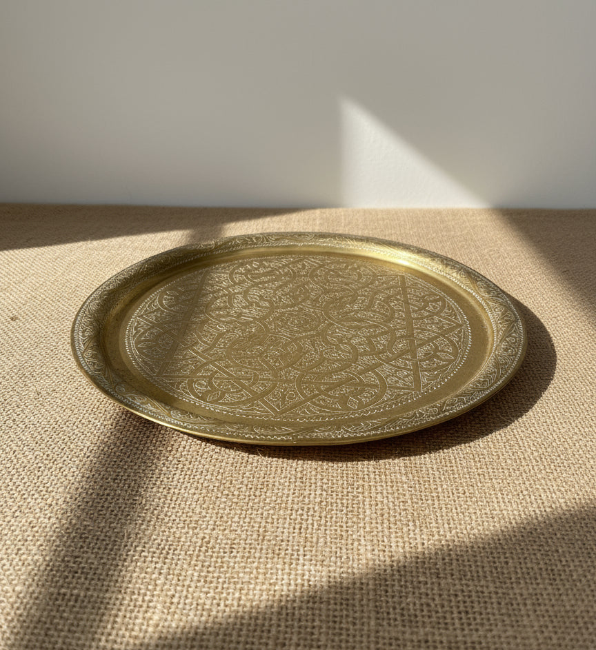Hand-engraved brass Indo-Persian round tray from the 20th century, detailed with ornamental patterns ideal for luxury home décor — Hommes and Gardens, Objects Collection, Landscape Architect, Interior Designer, Outdoor Living, Art, Furniture, Objects, Best Gifts, Nature, Backyard, Yard, Outdoor Decorations, Home Decor, Home Design, Luxury Design.