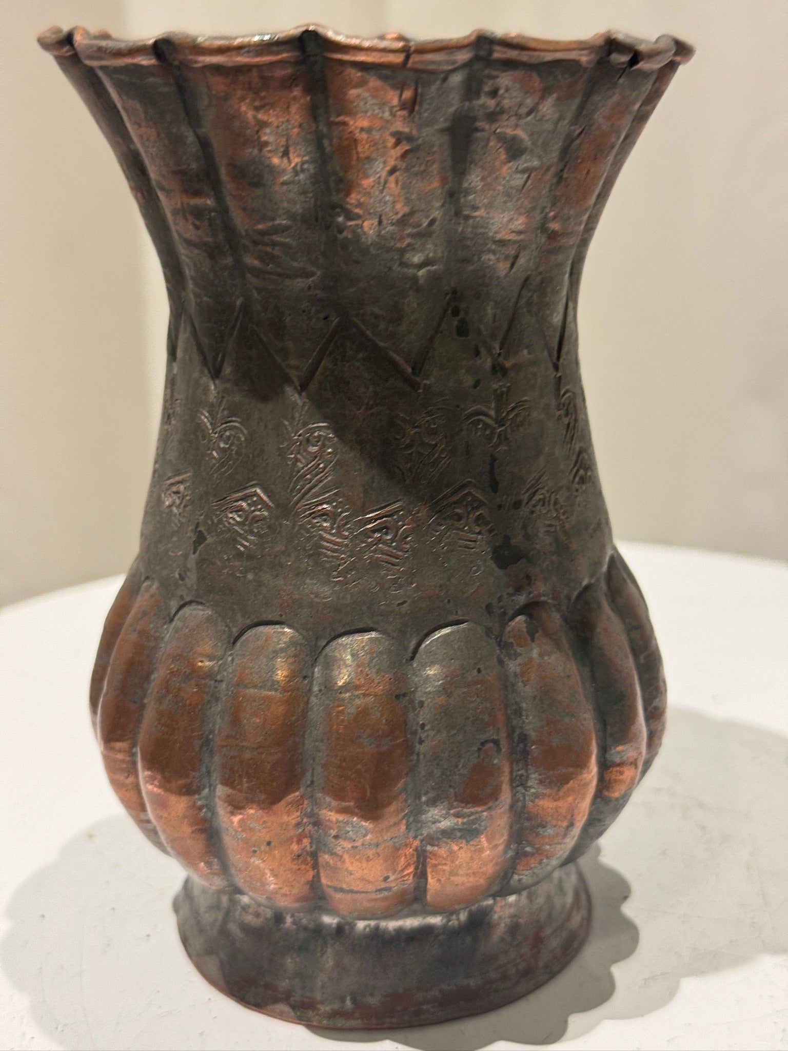 Hand-etched Egyptian copper vase featuring ornate engravings, scalloped rim, and aged patina, a vintage metalwork piece of cultural elegance — Hommes and Gardens, Vases + Vessels Collection, Landscape Architect, Interior Designer, Outdoor Living, Art, Furniture, Objects, Best Gifts, Nature, Backyard, Yard, Outdoor Decorations, Home Decor, Home Design, Luxury Design.