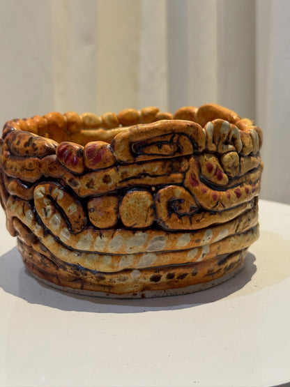 Handcrafted clay swirly coiled ceramic vessel featuring an earthy glaze of brown, amber, and burgundy tones, sculptural artisan pottery ideal for organic modern interiors — Hommes and Gardens, Vases Collection, Landscape Architect, Interior Designer, Outdoor Living, Art, Furniture, Objects, Best Gifts, Nature, Backyard, Yard, Outdoor Decorations, Home Decor, Home Design, Luxury Design.
