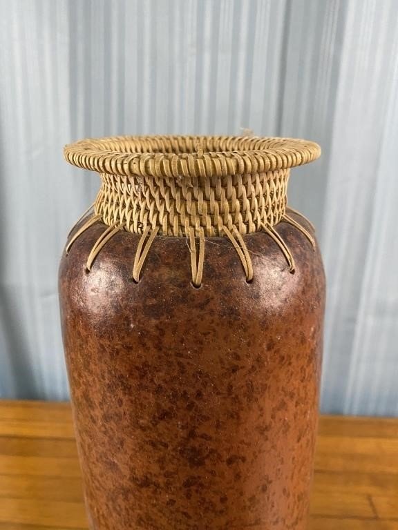 Handcrafted earthenware vase with reed-wrapped rim in warm reddish-orange tone, ideal for rustic and natural interiors — Hommes and Gardens, Pots + Planters, Vases + Vessels Collection, home decor, outdoor decorations, home design, luxury design, Landscape Architect, Interior Designer, Outdoor Living, Art, Furniture, Objects, Best Gifts, Nature, Backyard, Yard.