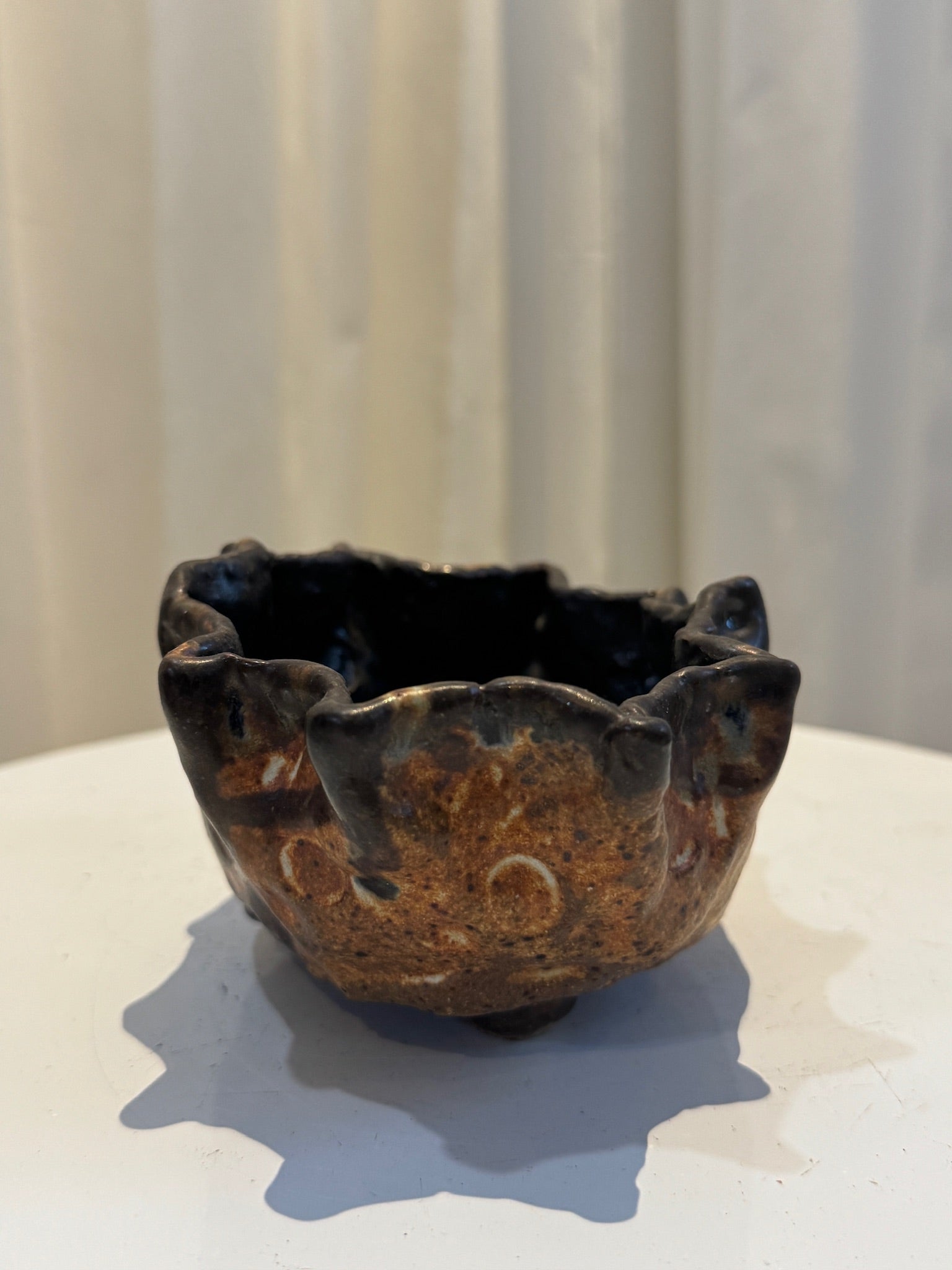 Handcrafted freeform ceramic vase in studio pottery style with earthy glaze and tactile surface indentations, inspired by wabi-sabi aesthetics — Hommes and Gardens, Vases + Vessels Collection, Landscape Architect, Interior Designer, Outdoor Living, Art, Furniture, Objects, Best Gifts, Nature, Backyard, Yard, Outdoor Decorations, Home Decor, Home Design, Luxury Design.