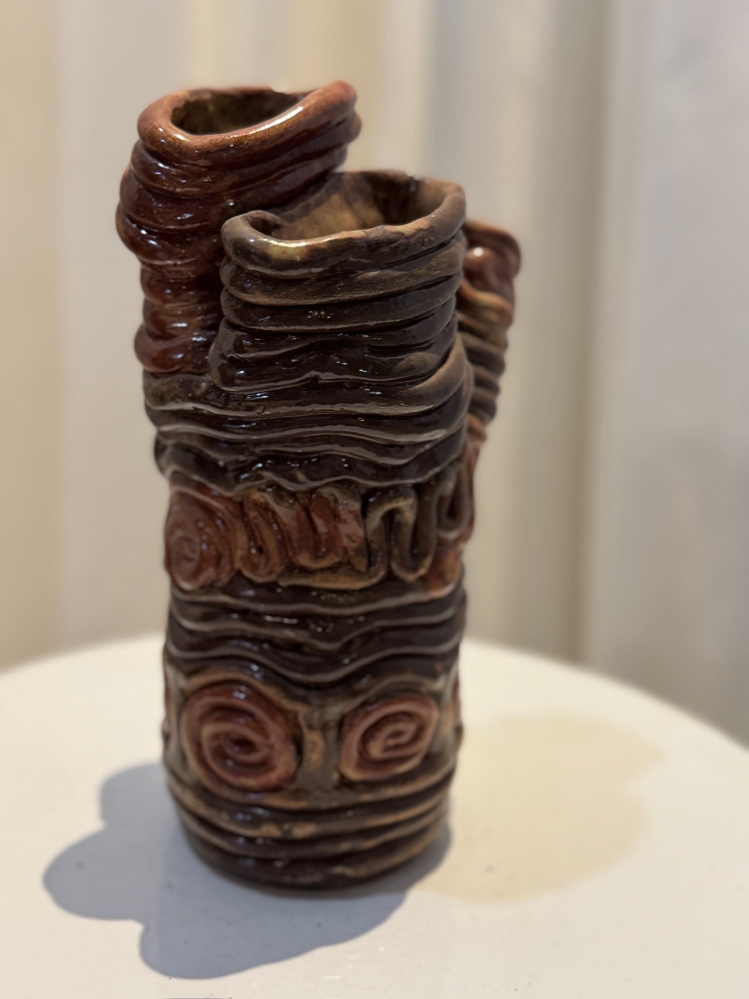 Handcrafted organic clay swirl vase with four sculptural openings and natural glaze finish, a modern art pottery statement piece — Hommes and Gardens, Vases + Vessels Collection, Landscape Architect, Interior Designer, Outdoor Living, Art, Furniture, Objects, Best Gifts, Nature, Backyard, Yard, Outdoor Decorations, Home Decor, Home Design, Luxury Design.