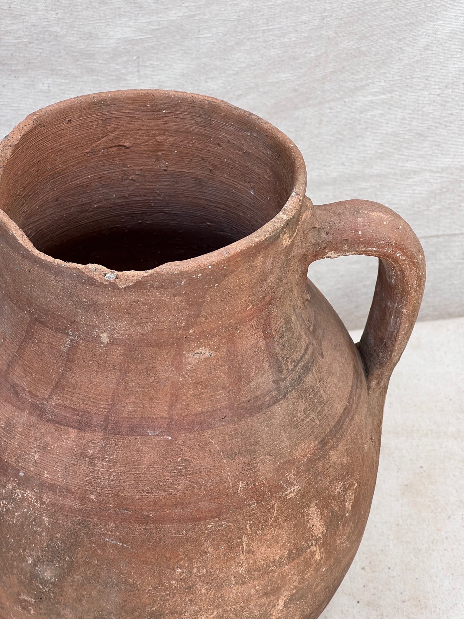 Handcrafted terracotta jug in rustic earthenware finish, antique cultural pottery symbolising craftsmanship and Mediterranean heritage — Hommes and Gardens, Vases + Vessels Collection, Landscape Architect, Interior Designer, Outdoor Living, Art, Furniture, Objects, Best Gifts, Nature, Backyard, Yard, Outdoor Decorations, Home Decor, Home Design, Luxury Design.