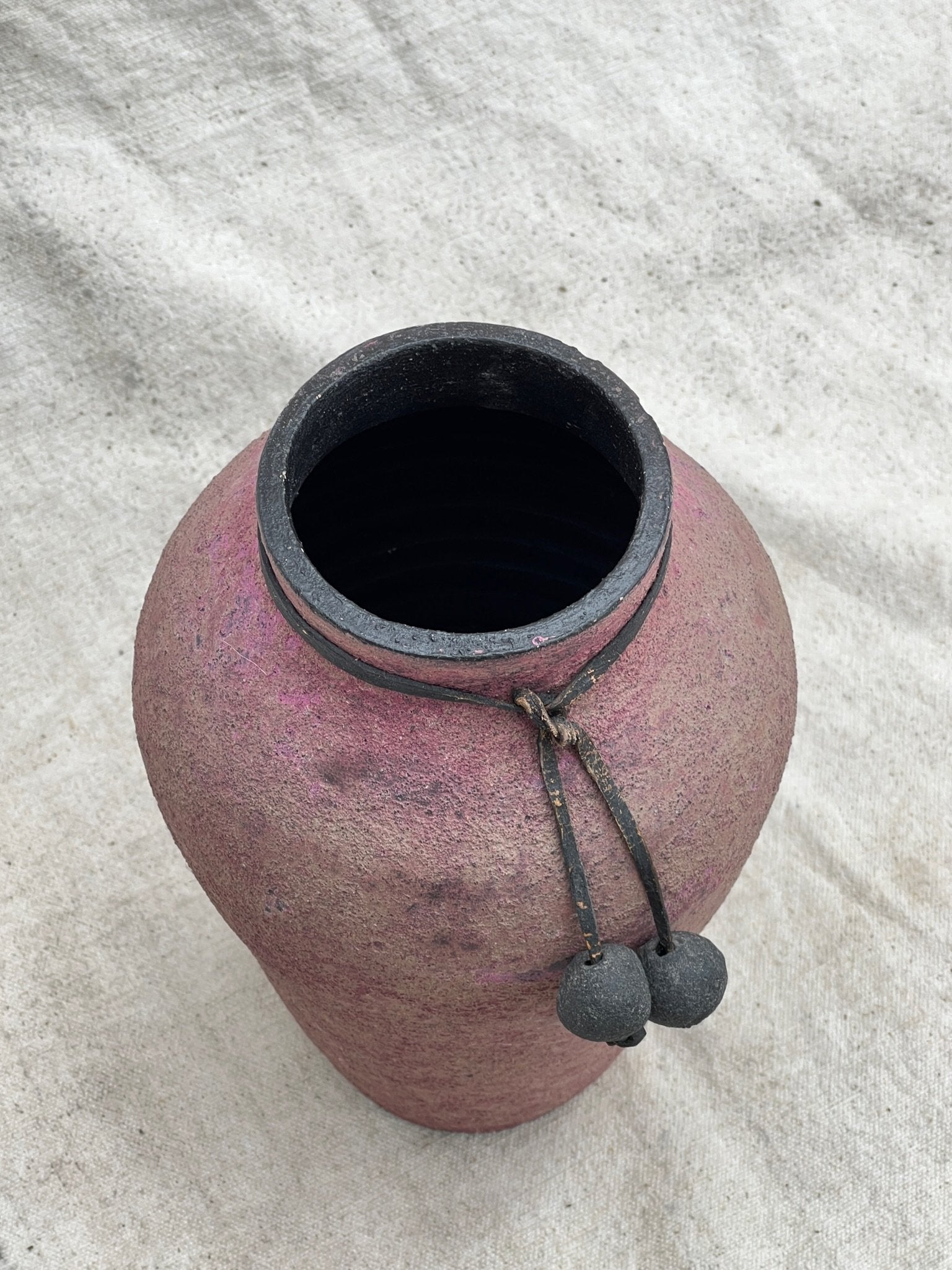 Handcrafted pottery urn with textured body and beaded accent, finished in rich purple and pink hues, timeless decorative piece — Hommes and Gardens, Pots + Vessels Collection, Landscape Architect, Interior Designer, Outdoor Living, Outdoor Decorations, Home Decor, Home Design, Luxury Design, Art, Furniture, Objects, Best Gifts, Nature, Backyard, Yard.