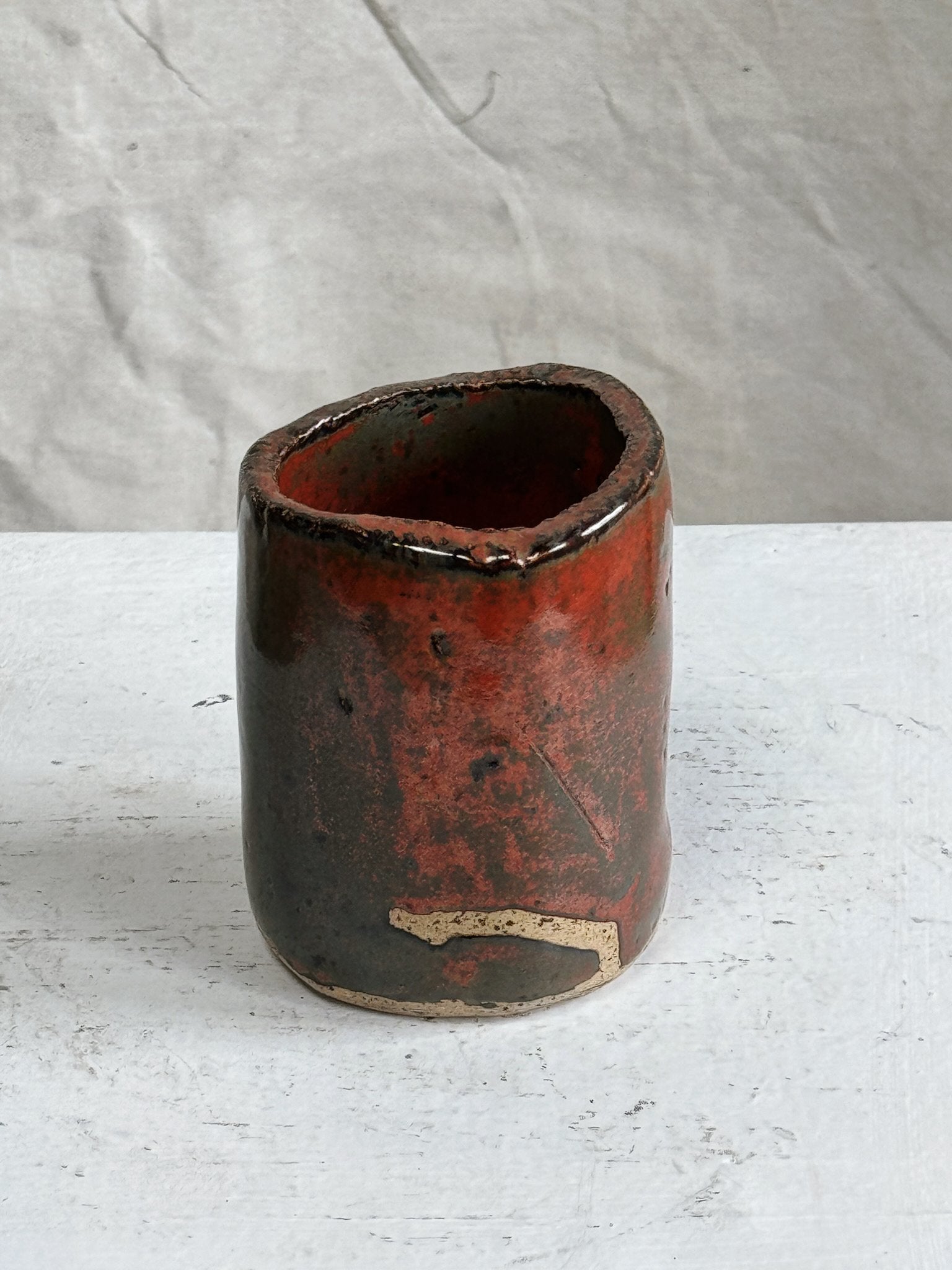 Vintage Signed Handmade Glazed Ceramic Vase with stunning red slip glaze and earthy colors, antique condition. hommes + gardens estudio.