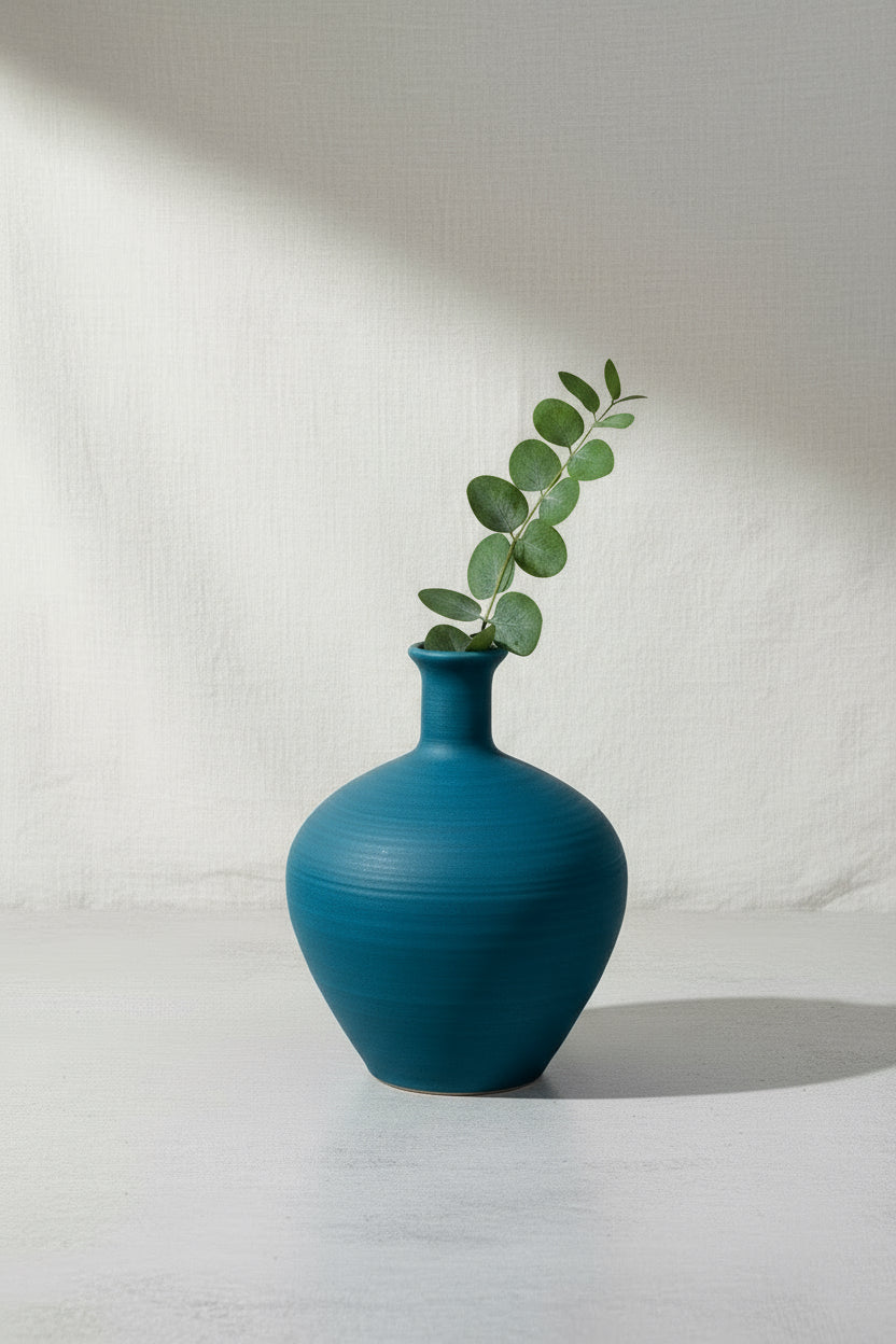 VINTAGE BLUE STONEWARE VASE with greenery, 7'H x 6'W, perfect for home decor, hommes + gardens estudio.