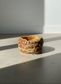 Handmade coiled clay vessel with warm earthy tones and sculptural design, a unique ceramic art piece celebrating organic craftsmanship — Hommes and Gardens, Vases Collection, Landscape Architect, Interior Designer, Outdoor Living, Art, Furniture, Objects, Best Gifts, Nature, Backyard, Yard, Outdoor Decorations, Home Decor, Home Design, Luxury Design.