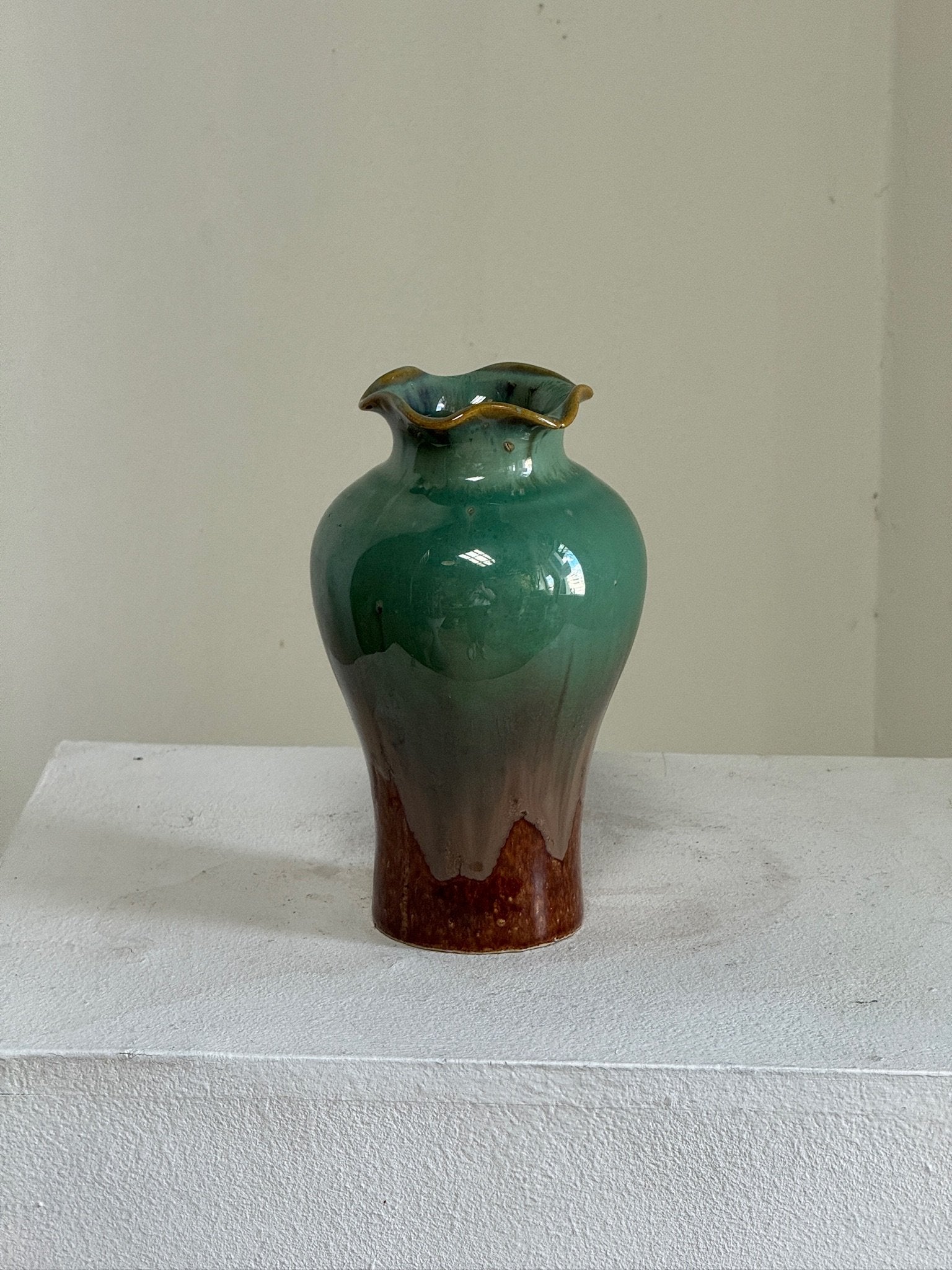 Handmade drip glaze ceramic vase with ruffled rim, artisanal pottery piece showcasing fluid glaze patterns and vintage elegance — Hommes and Gardens, Pots + Vessels Collection, Landscape Architect, Interior Designer, Outdoor Living, Outdoor Decorations, Home Decor, Home Design, Luxury Design, Art, Furniture, Objects, Best Gifts, Nature, Backyard, Yard.