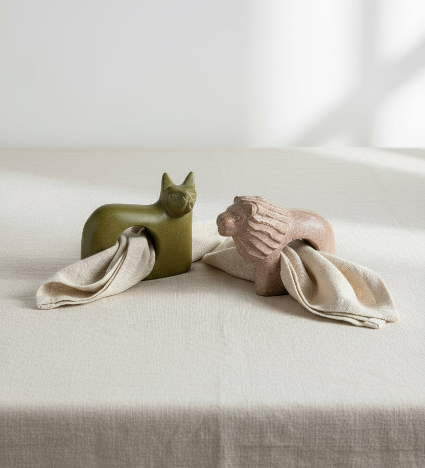 Handmade Kenyan soapstone cat and lion napkin rings, hand-carved from natural stone to celebrate African artistry and wildlife heritage — Hommes and Gardens, Home Decor Collection, Outdoor Decorations, Landscape Architect, Interior Designer, Outdoor Living, Home Design, Luxury Design, Art, Furniture, Objects, Best Gifts, Nature, Backyard, Yard.