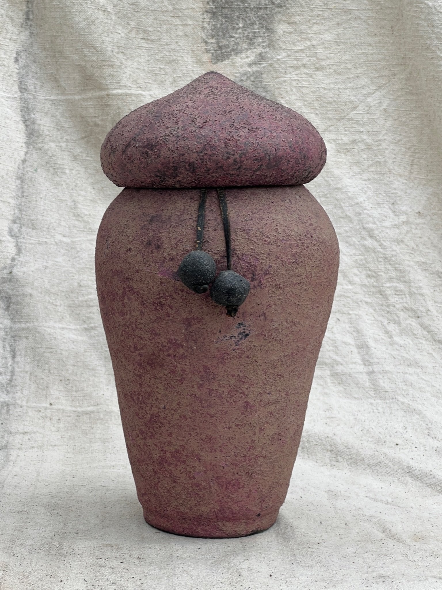 Handmade textured urn with beaded accent in purple and pink hues, a stunning vintage ceramic piece showcasing artisanal craftsmanship — Hommes and Gardens, Pots + Vessels Collection, Landscape Architect, Interior Designer, Outdoor Living, Outdoor Decorations, Home Decor, Home Design, Luxury Design, Art, Furniture, Objects, Best Gifts, Nature, Backyard, Yard.
