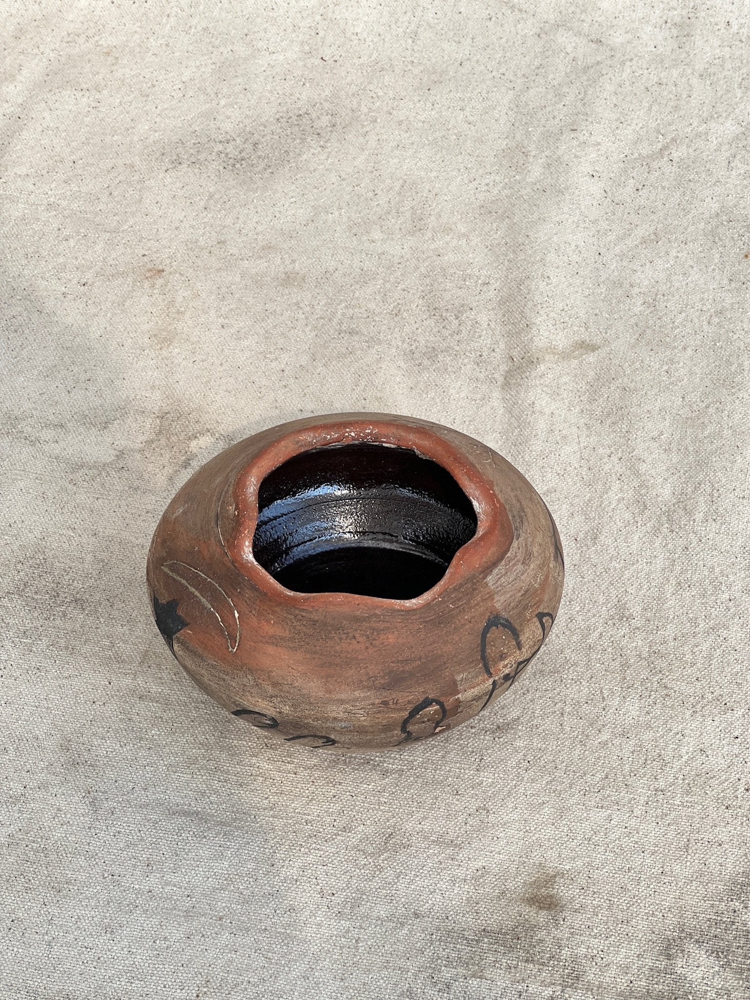 Vintage Clay Vase with Primitive Drawings (Signed) showing primitive animal art and a weathered finish, hommes + gardens estudio.