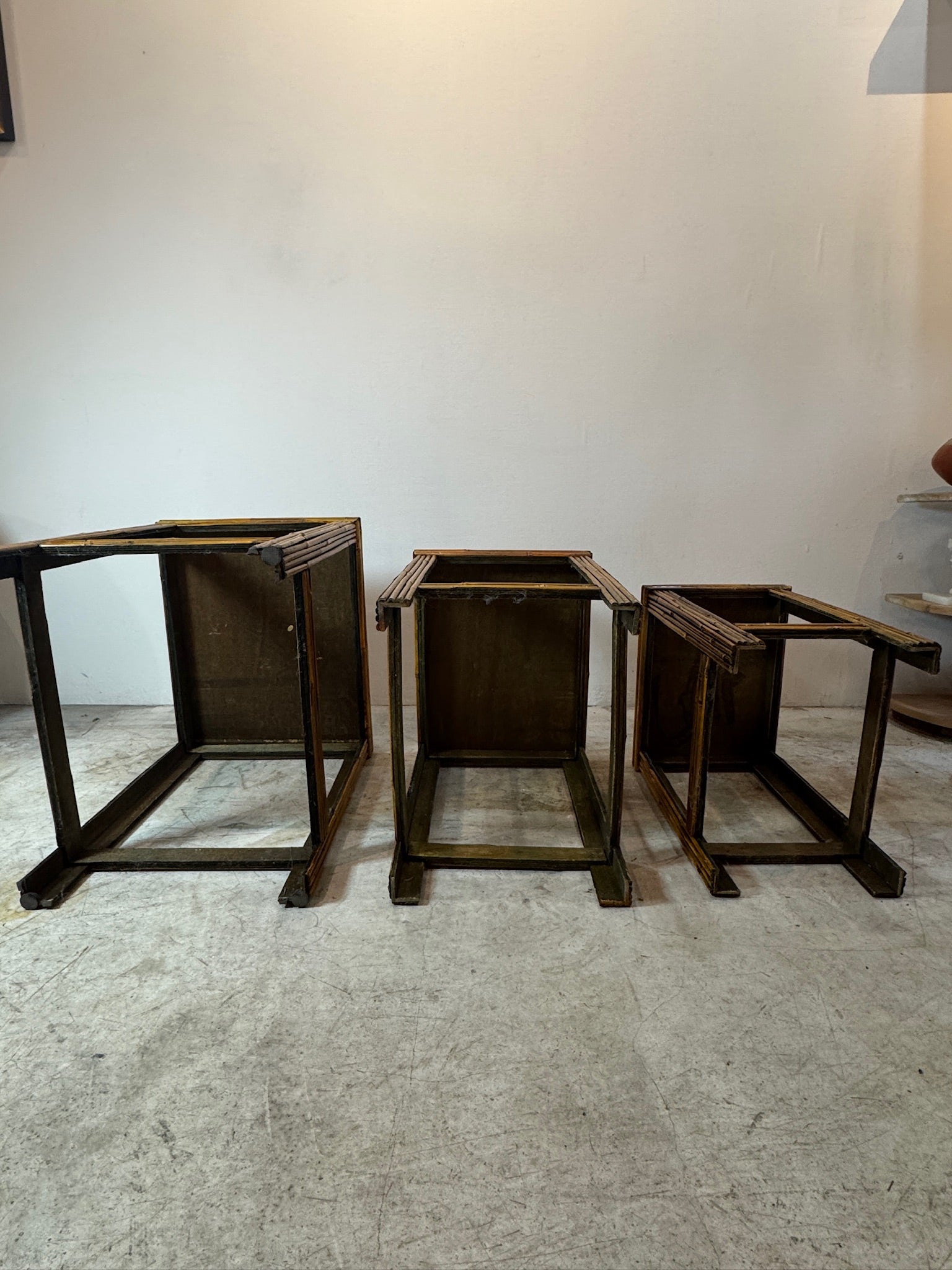 Handwoven bamboo and rattan nesting tables in mid-century modern style, stackable and functional for versatile home design — Hommes and Gardens, Furniture Collection, Landscape Architect, Interior Designer, Outdoor Living, Art, Furniture, Objects, Best Gifts, Nature, Backyard, Yard, Outdoor Decorations, Home Decor, Home Design, Luxury Design.