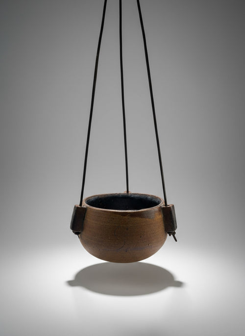 1972 Karroll Studio Pottery Hanging Planter – Rustic Ceramic with Leather, unique vintage piece, earthy brown and glossy black interior, hommes + gardens estudio.