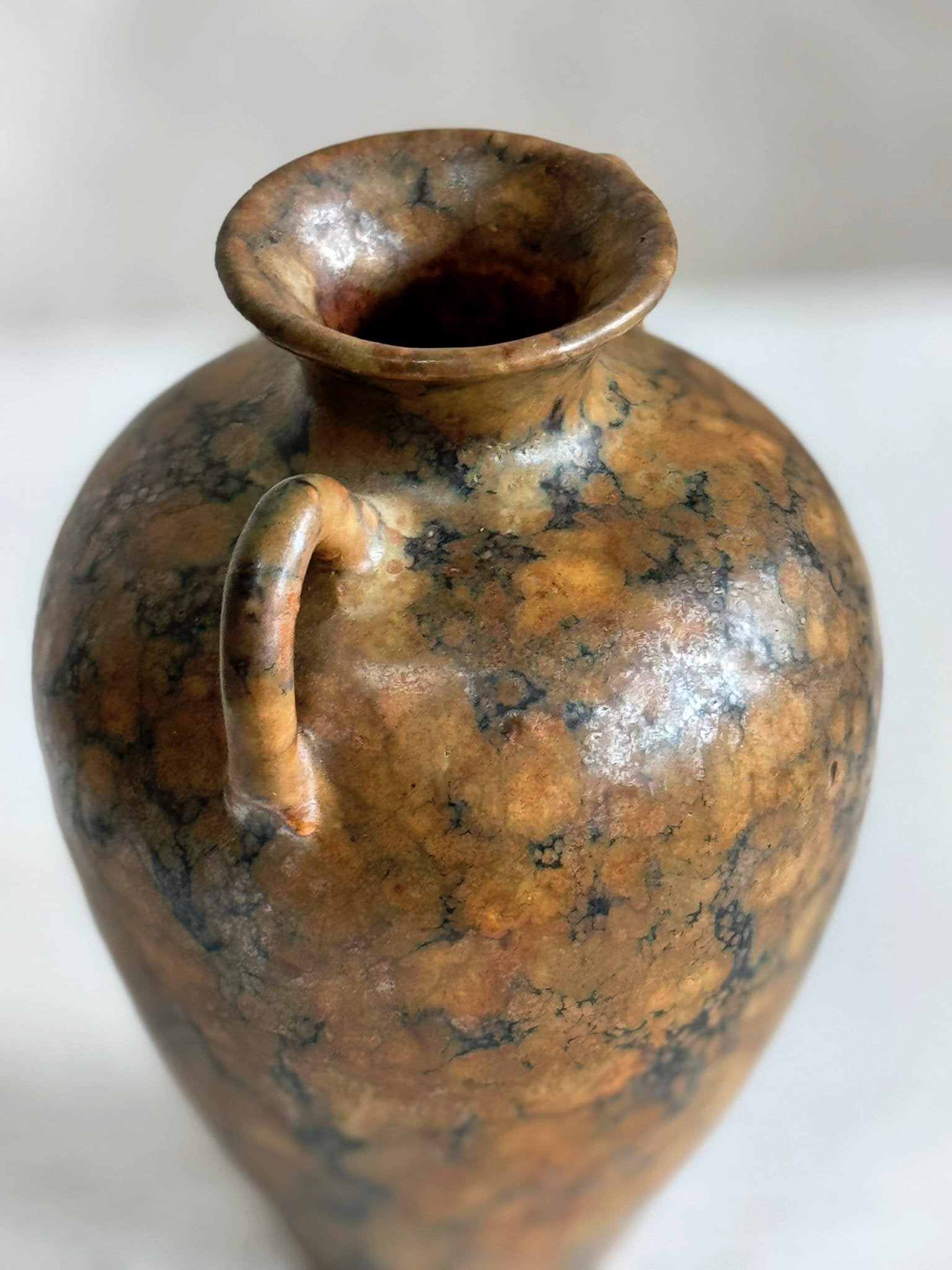 Marble-inspired handled vintage brown urn vase with mottled earth-tone glaze, signed pottery piece radiating rustic elegance — Hommes and Gardens, Pots + Vessels Collection, Landscape Architect, Interior Designer, Outdoor Living, Outdoor Decorations, Home Decor, Home Design, Luxury Design, Art, Furniture, Objects, Best Gifts, Nature, Backyard, Yard.