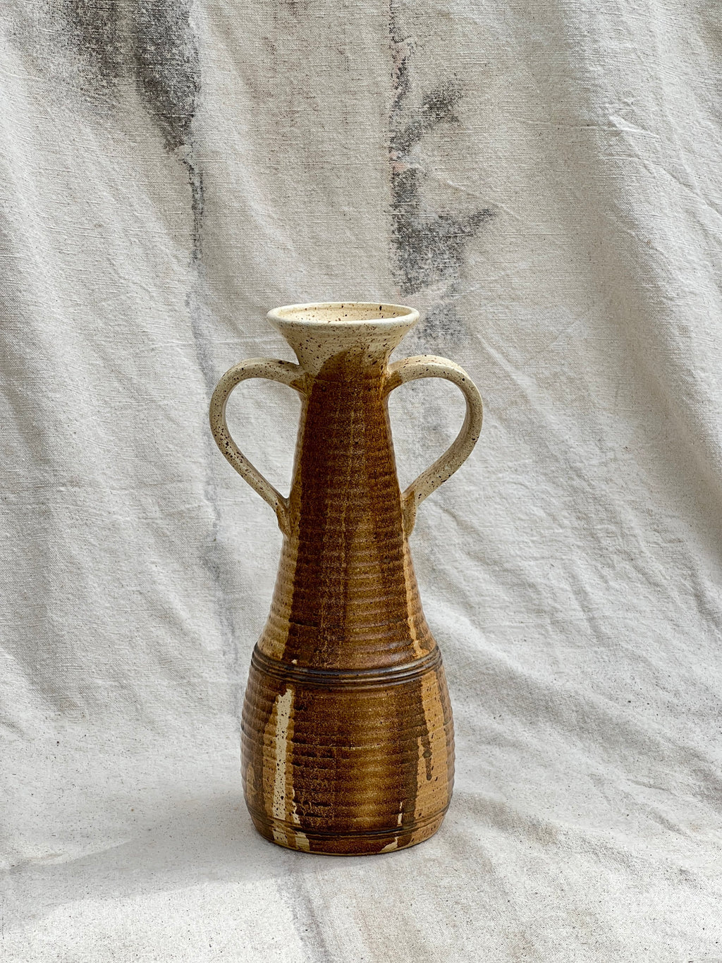 MCM handmade ceramic vase with handles, signed and dated 1984, featuring earthy brown glaze and sculptural mid-century form — Hommes and Gardens, Pots + Vessels Collection, Landscape Architect, Interior Designer, Outdoor Living, Outdoor Decorations, Home Decor, Home Design, Luxury Design, Art, Furniture, Objects, Best Gifts, Nature, Backyard, Yard.