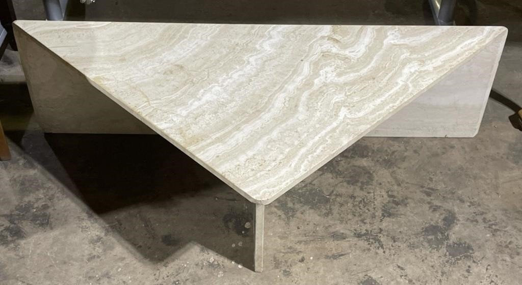 Vintage Travertine Marble Corner Table featuring a unique triangular design and natural veining, perfect for elegant spaces. hommes + gardens estudio.