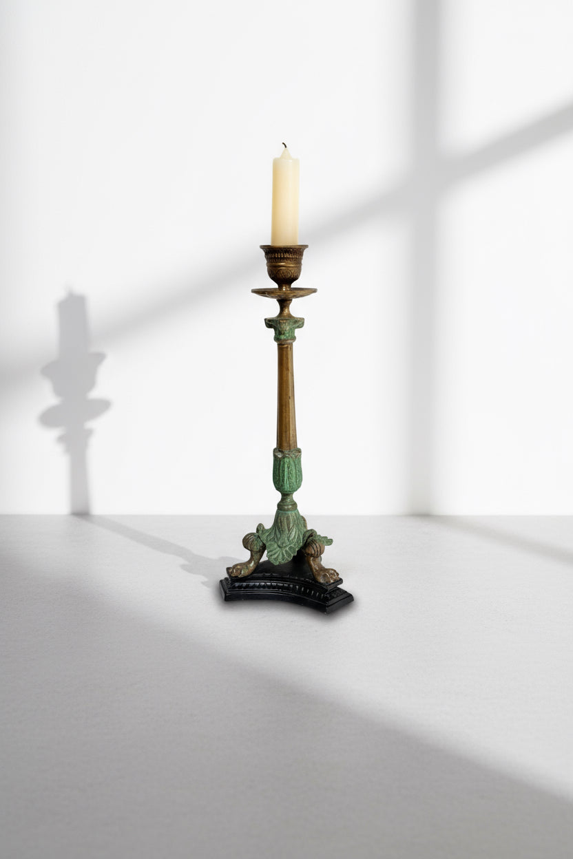 Midcentury Italian Brass/Bronze Candlesticks showcasing intricate details and claw feet. hommes + gardens estudio.