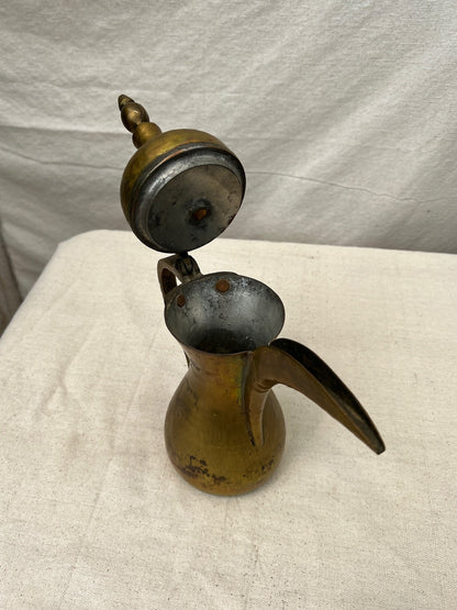 Middle Eastern brass Dallah antique Arabic coffee pot with curved spout and engraved motifs, perfect for collectors of cultural home décor — Hommes and Gardens, Objects Collection, Landscape Architect, Interior Designer, Outdoor Living, Art, Furniture, Objects, Best Gifts, Nature, Backyard, Yard, Outdoor Decorations, Home Decor, Home Design, Luxury Design.