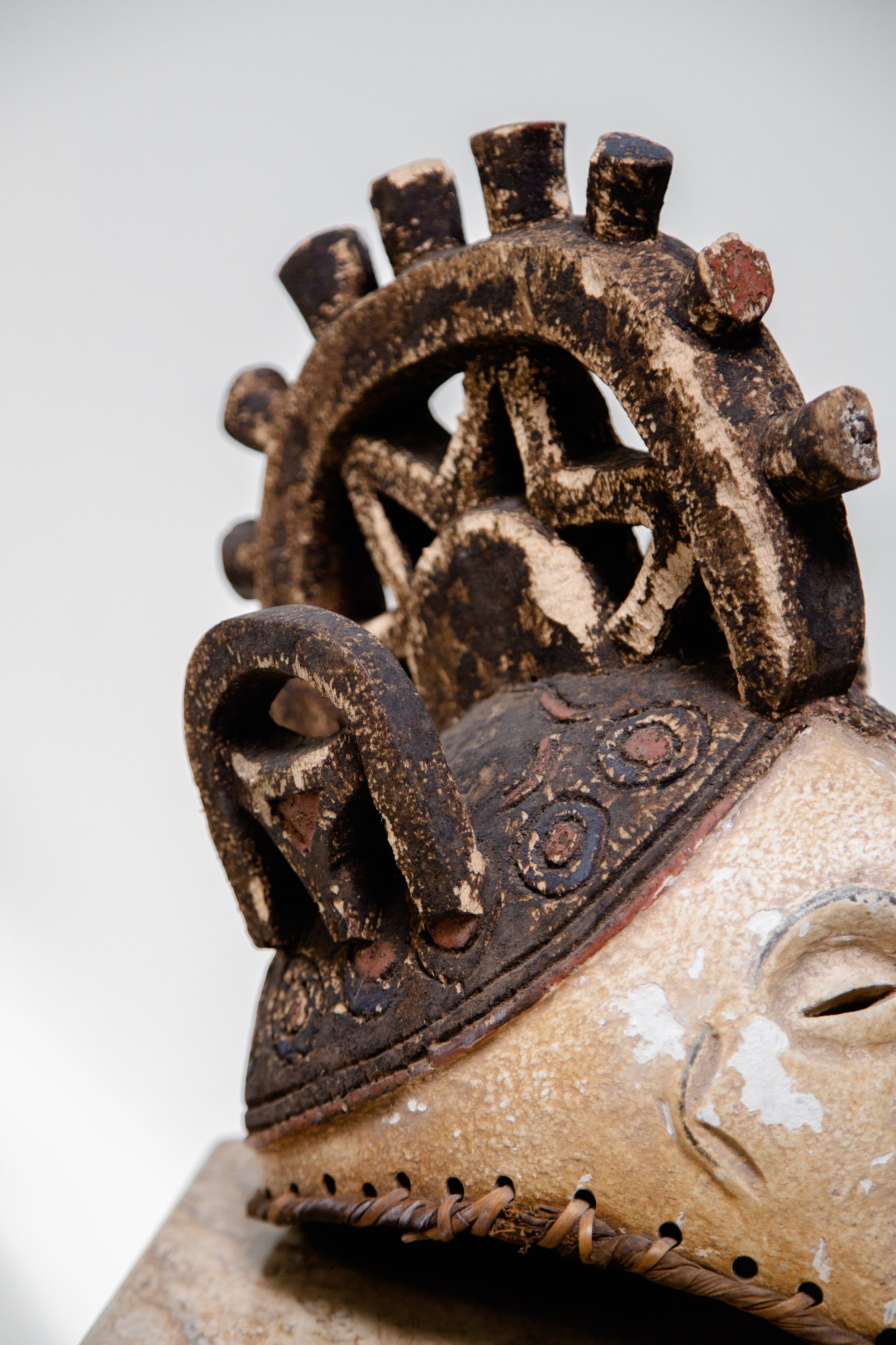 Nigerian Igbo mask carved from wood with traditional fabric accents, an antique African wall sculpture rich in heritage — Hommes and Gardens, Objects Collection, home decor, outdoor decorations, home design, luxury design, Landscape Architect, Interior Designer, Outdoor Living, Art, Furniture, Objects, Best Gifts, Nature, Backyard, Yard.