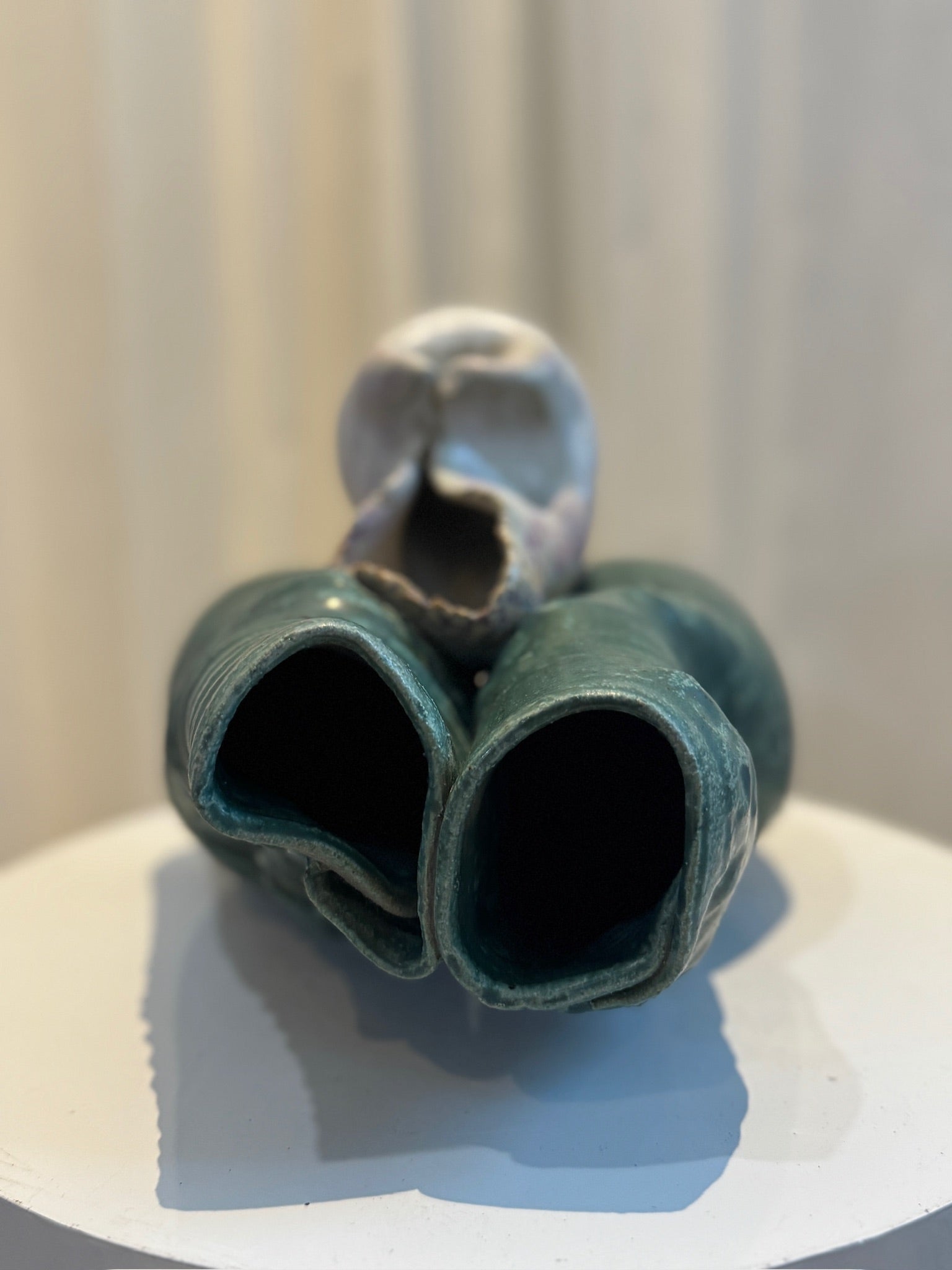 Organic handmade ceramic sculpture showcasing contrasting textures and colors, with green ribbed forms and off-white cracked glaze, collectible modern art — Hommes and Gardens, Pots + Planters Collection, Landscape Architect, Interior Designer, Outdoor Living, Art, Furniture, Objects, Best Gifts, Nature, Backyard, Yard, Outdoor Decorations, Home Decor, Home Design, Luxury Design.