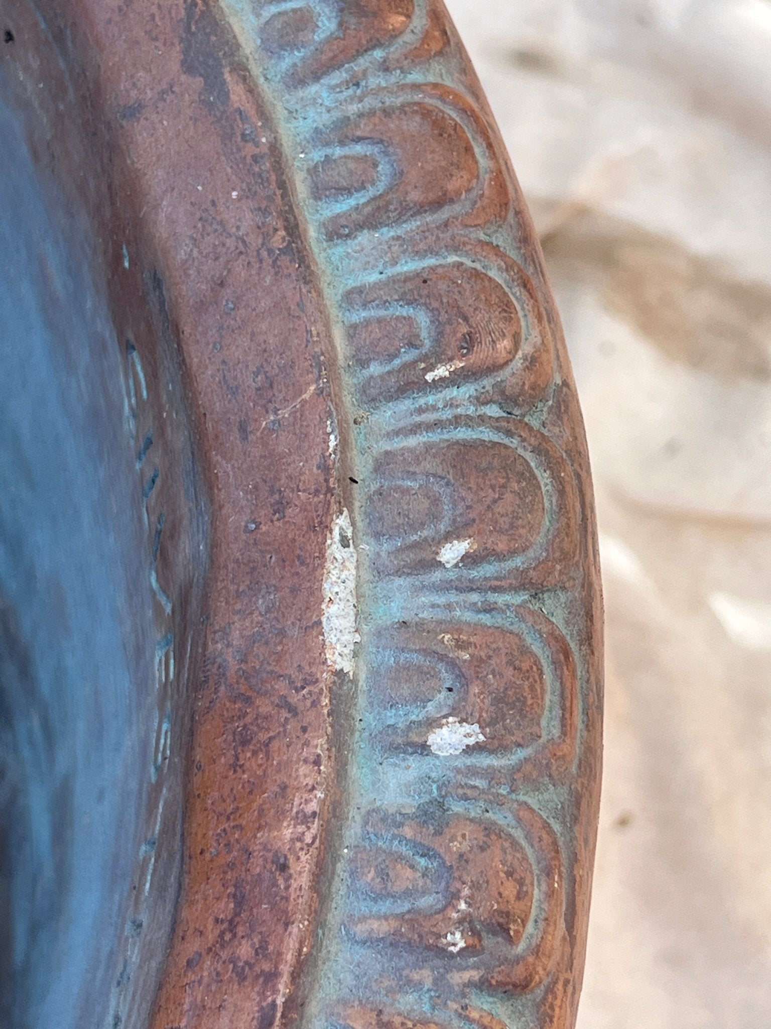 Detail of the Silvestri Terracotta Ornate Planter (Set of 2) showcasing intricate blue patina and vintage charm. hommes + gardens estudio.