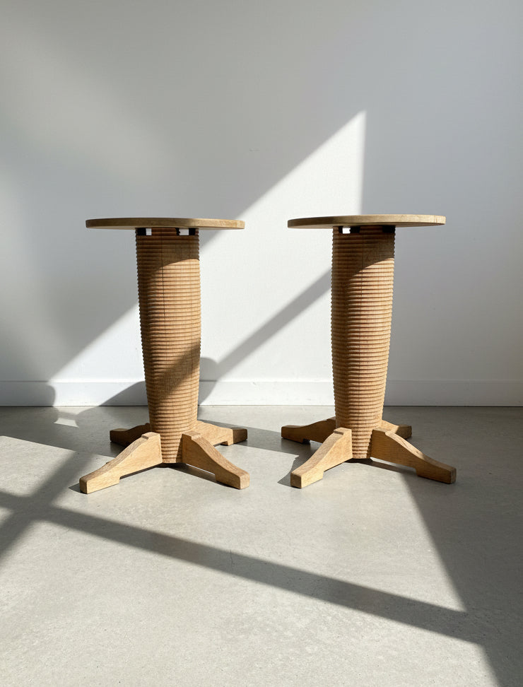 Pair of French Art Deco style oak side tables inspired by Charles Dudouyt, featuring sculptural ribbed pedestal bases and warm brown patina, elegant vintage furniture pieces — Hommes and Gardens, Furniture Collection, Home Decor, Landscape Architect, Interior Designer, Outdoor Living, Outdoor Decorations, Home Design, Luxury Design, Art, Furniture, Objects, Best Gifts, Nature, Backyard, Yard.