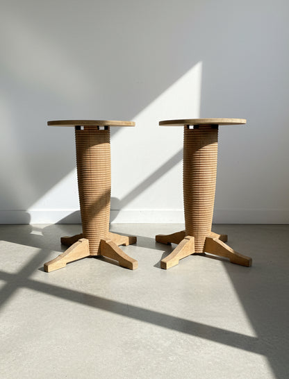 Pair of French Art Deco style oak side tables inspired by Charles Dudouyt, featuring sculptural ribbed pedestal bases and warm brown patina, elegant vintage furniture pieces — Hommes and Gardens, Furniture Collection, Home Decor, Landscape Architect, Interior Designer, Outdoor Living, Outdoor Decorations, Home Design, Luxury Design, Art, Furniture, Objects, Best Gifts, Nature, Backyard, Yard.